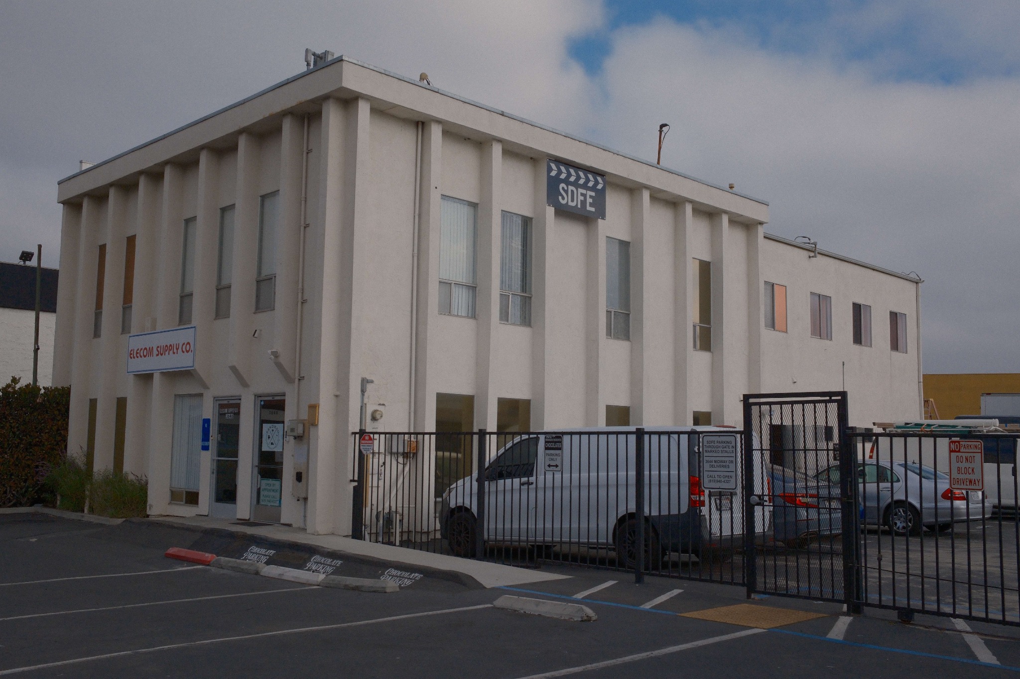 San Diego Film Equipment building with the SDFE sign and gated parking area